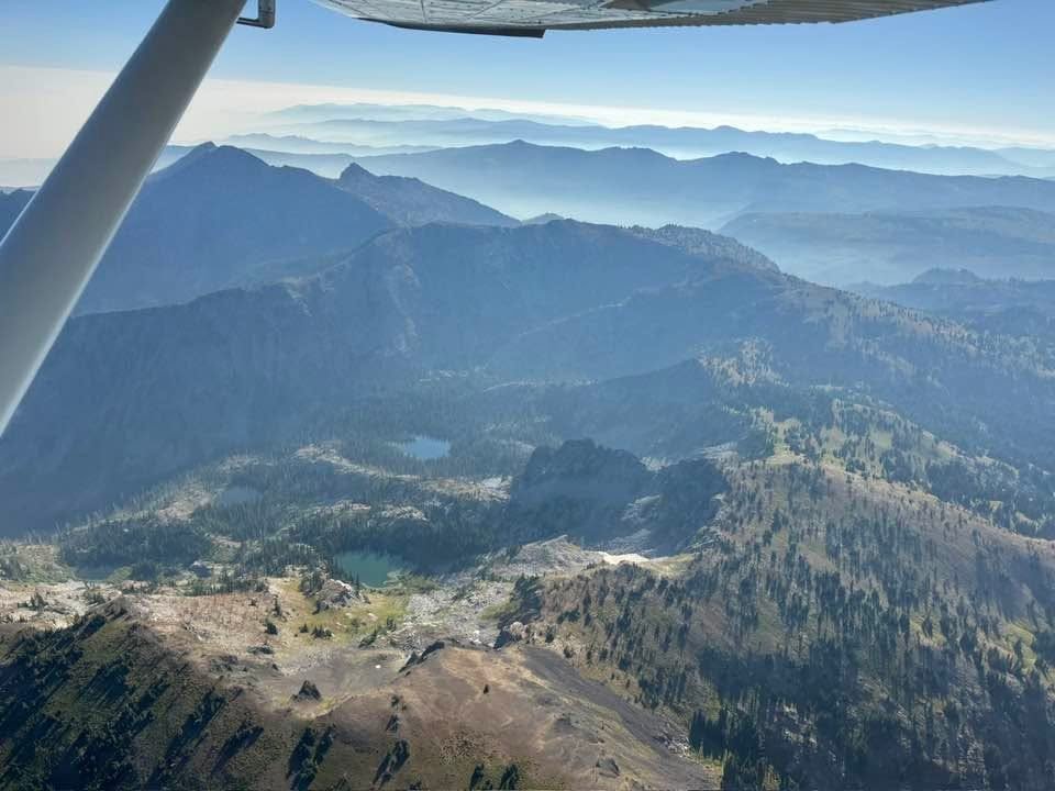 View under a high wing over Idaho mountains